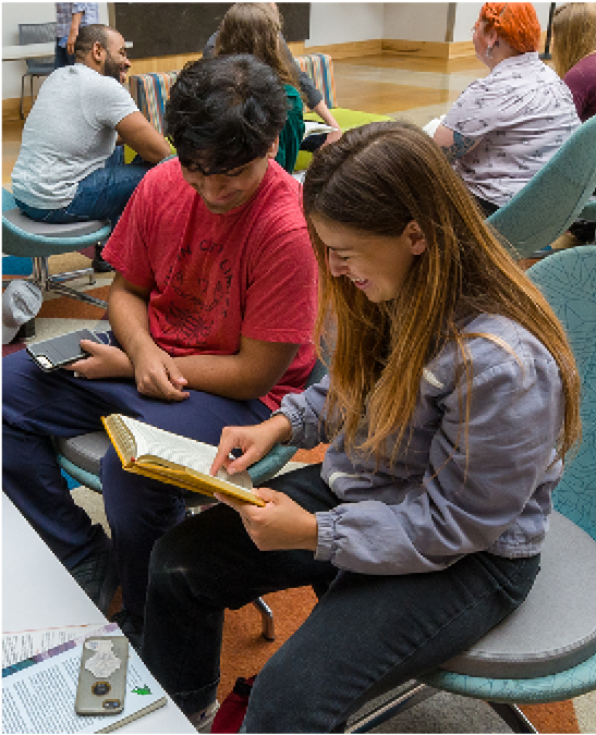 Students reading a book