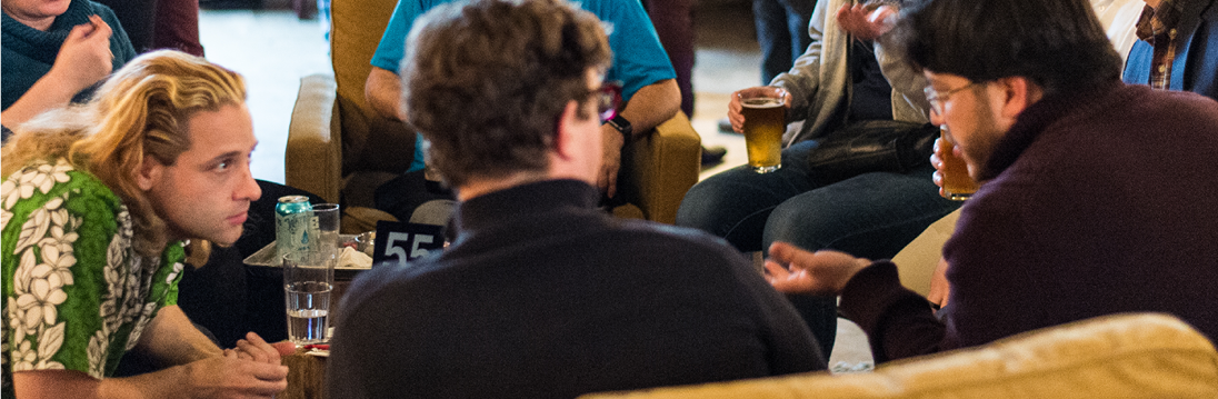 People talking at the Faculty Intellectual Feast