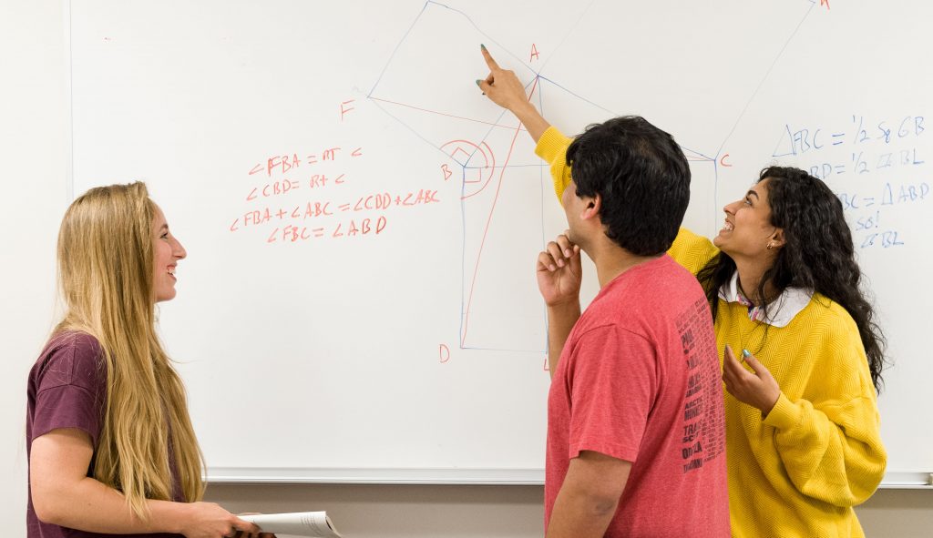 students at whiteboard