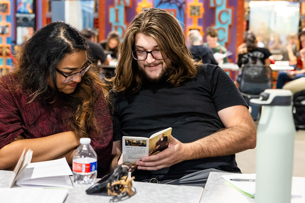 Austin Community College District (ACC) students at Highland Campus viewing a reading.
