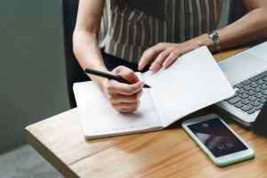 Woman taking notes