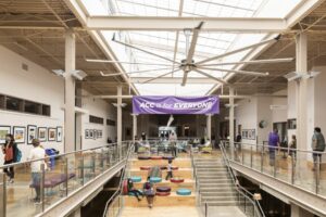 highland campus interior with sign saying "ACC is for Everyone"